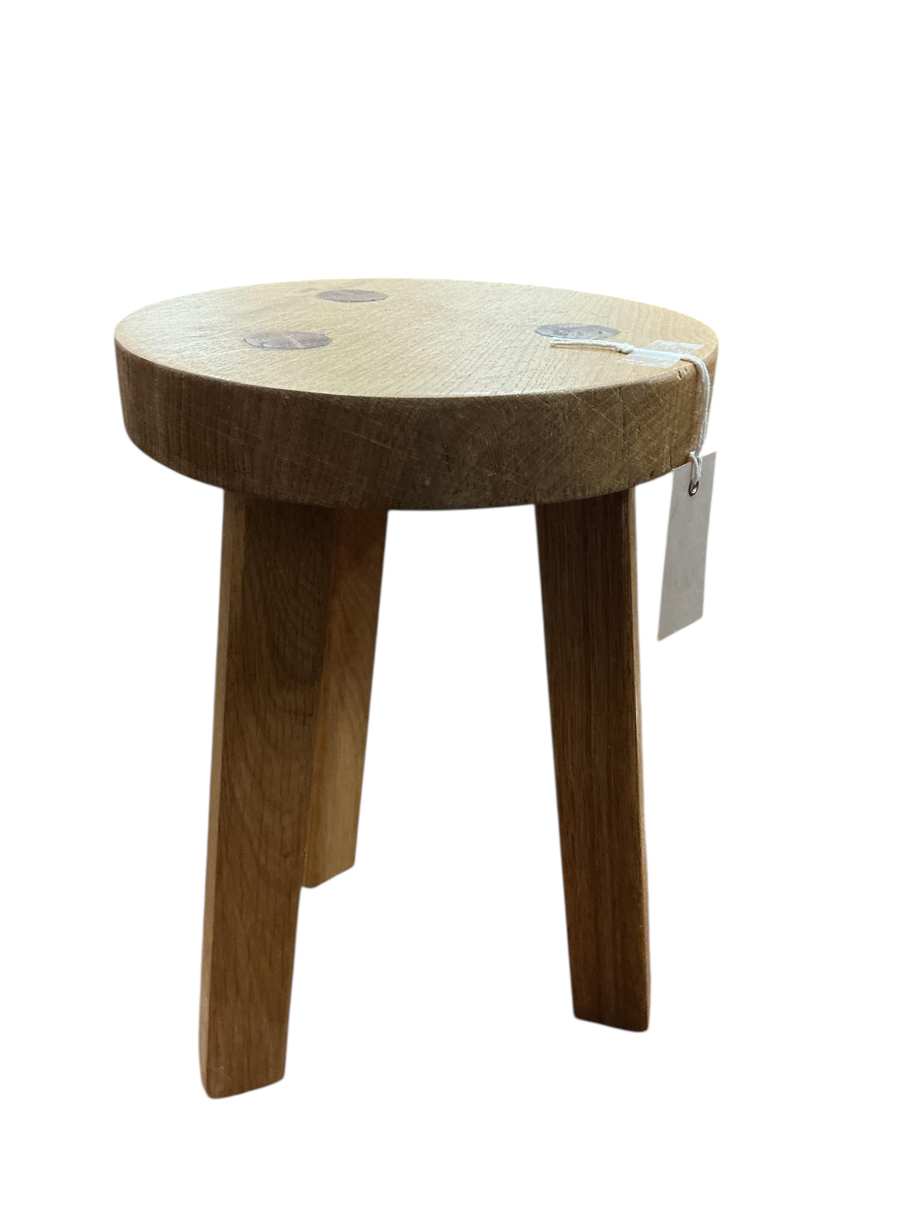 A pair of contemporary circular oak stools, diameter 24cm, height 36cm